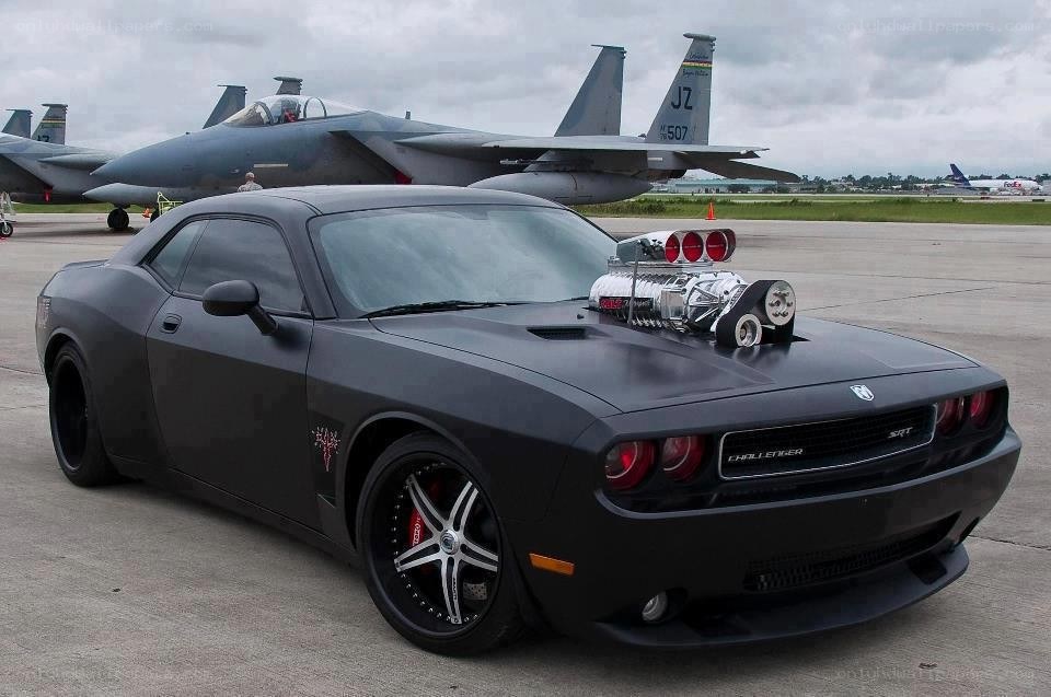 Black Dodge Challenger with supercharger