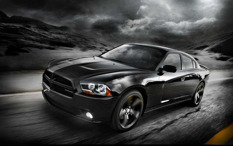 Black Dodge Charger in motion