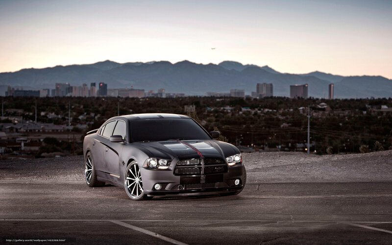 Black Dodge Charger on a hill