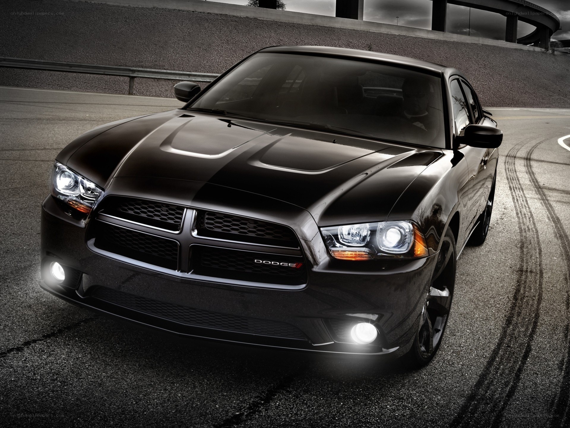 Black Dodge Charger on racetrack