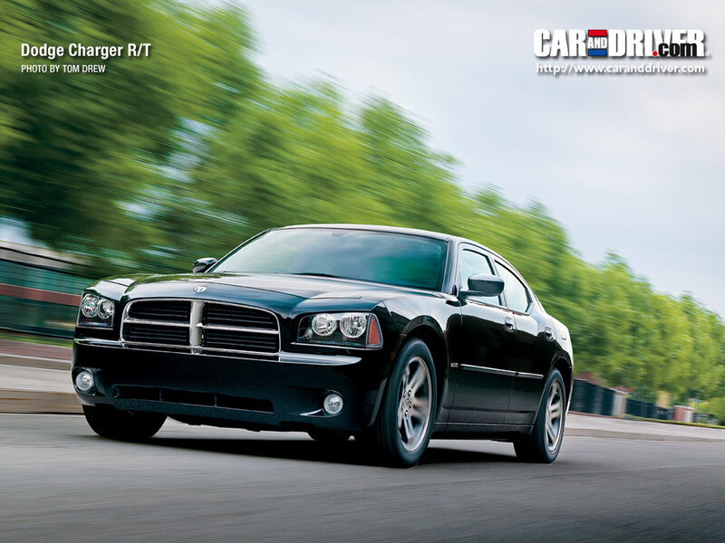Black Dodge Charger R/T in motion