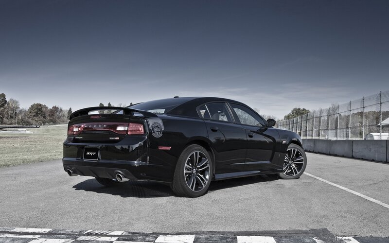 Black Dodge Charger SRT on racetrack