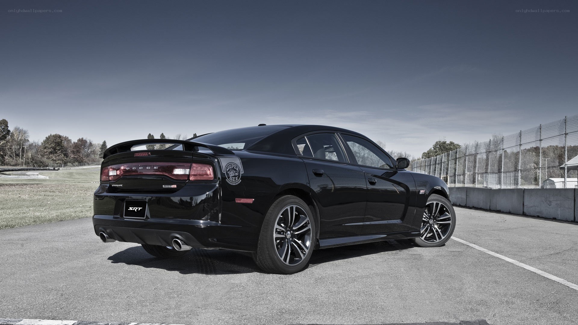 black dodge charger srt on track
