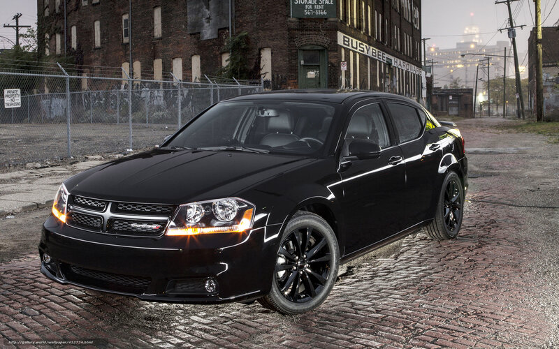 black dodge dart on cobblestones