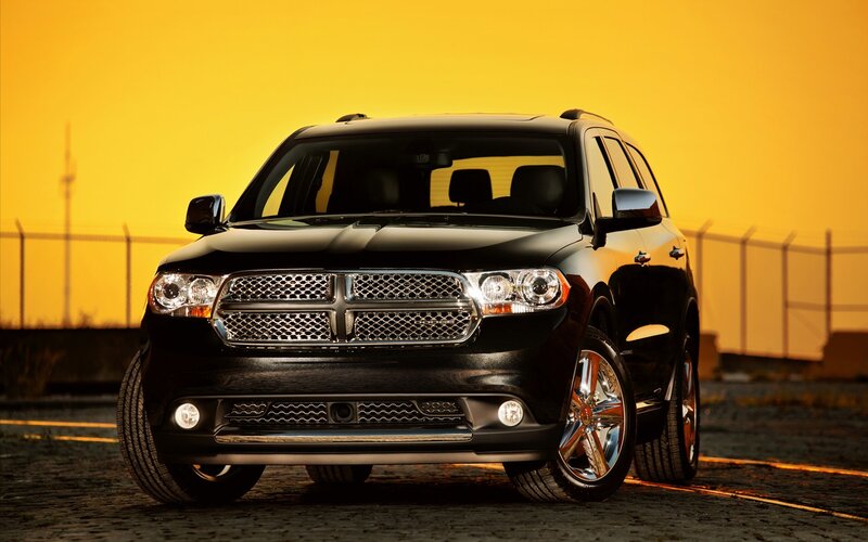 Black Dodge Durango at sunset