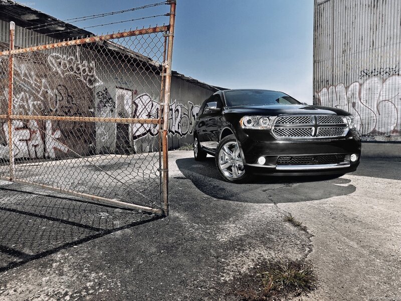 Black Dodge Durango in industrial lot