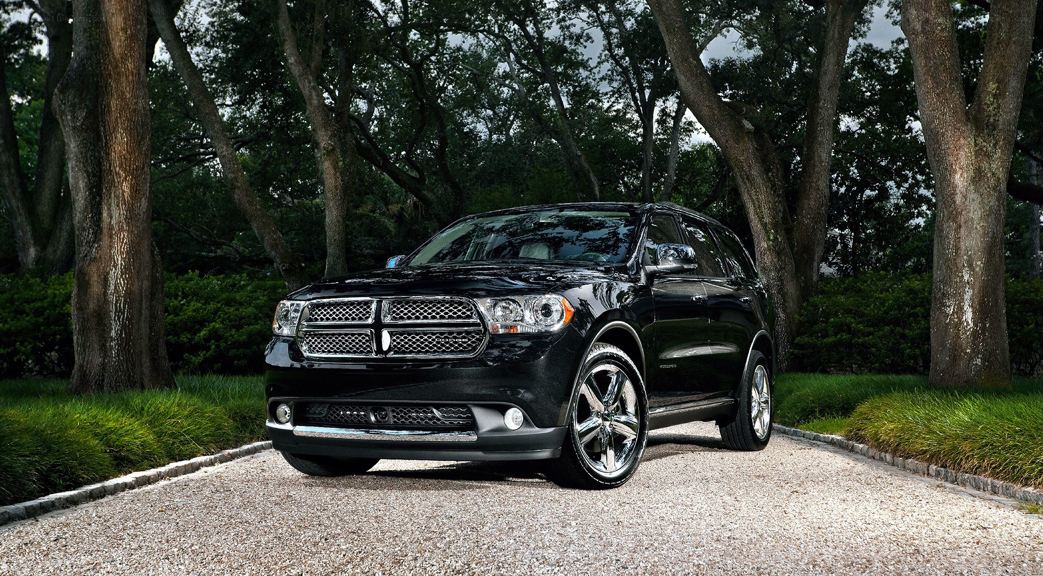 Black Dodge Durango on gravel path