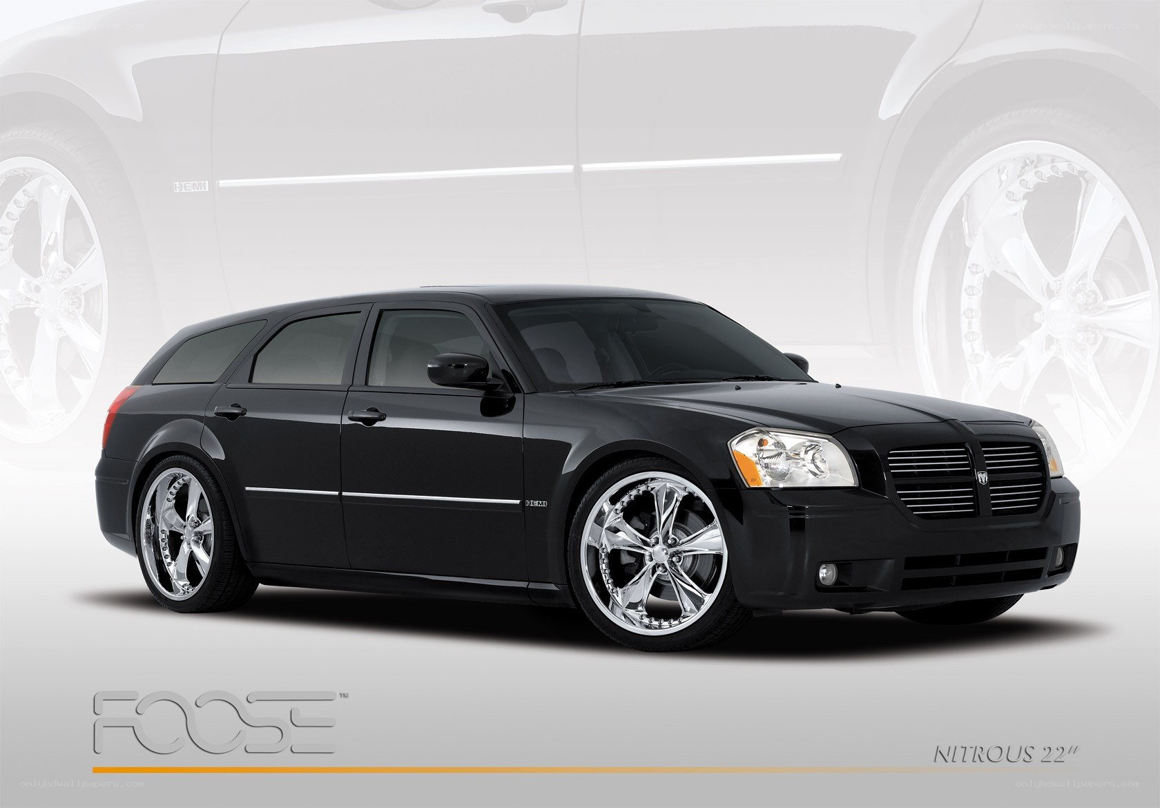 Black Dodge Magnum with custom wheels