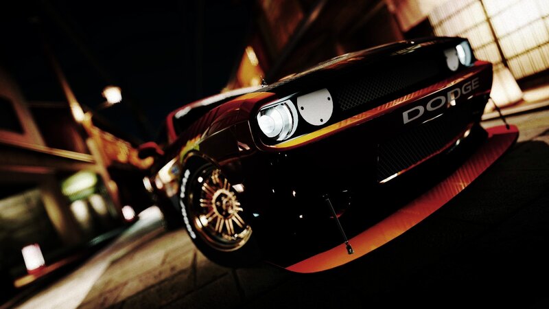black dodge muscle car at night