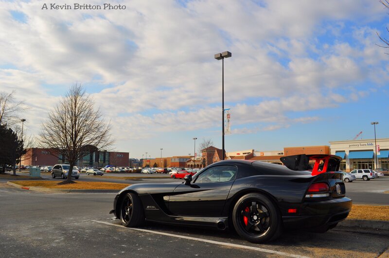 Black Dodge Viper in parking lot