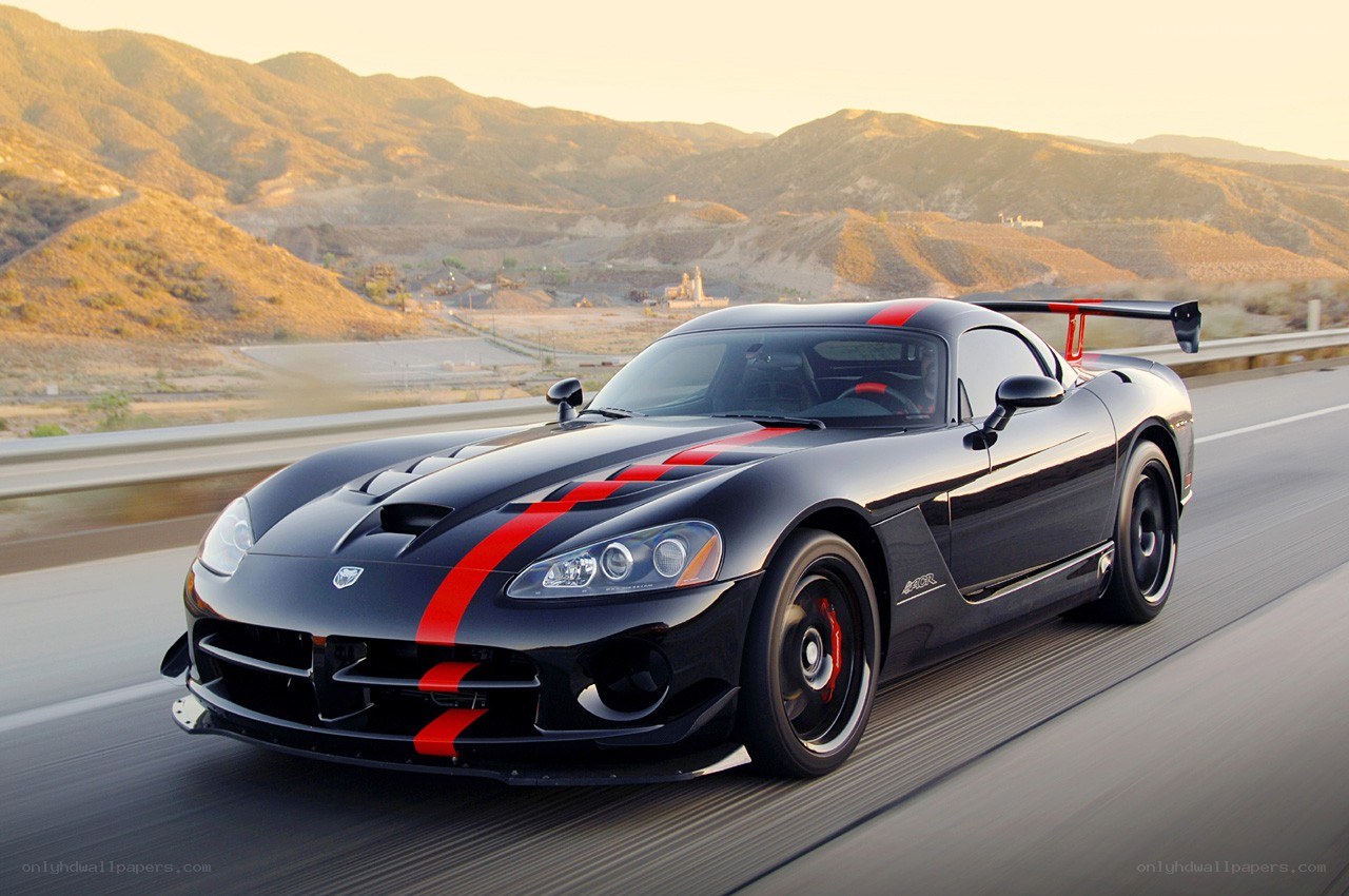 Black Dodge Viper on a mountain road