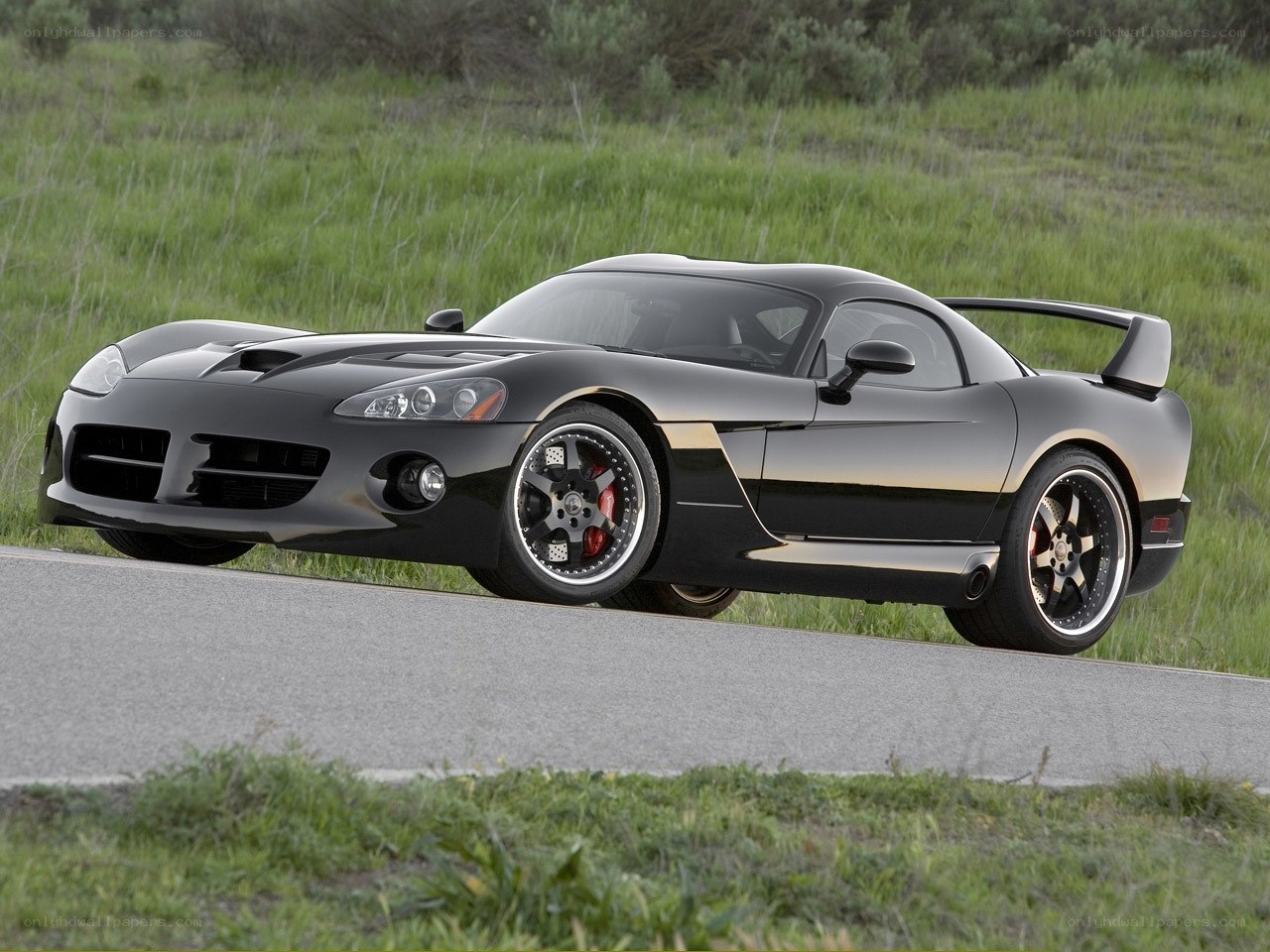 Black Dodge Viper on a road