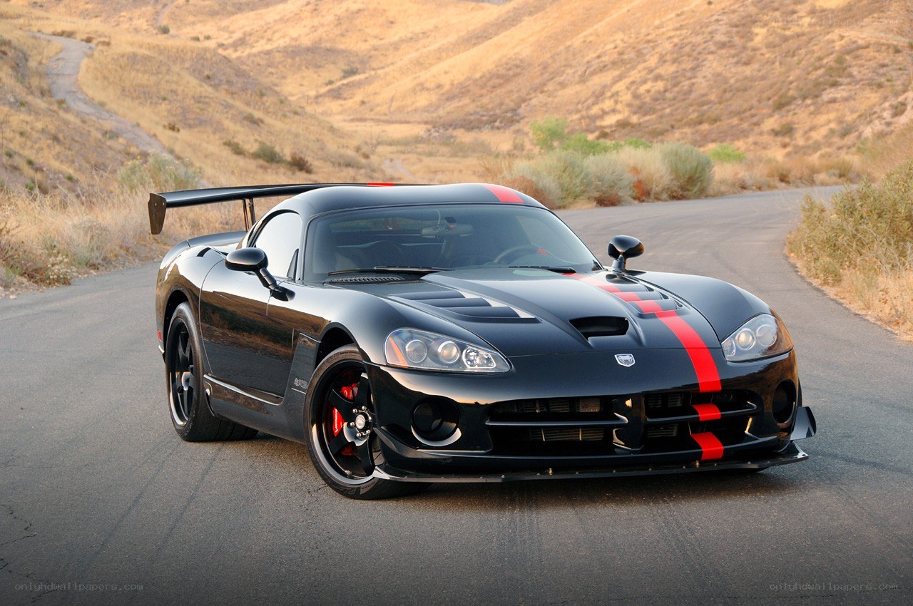Black Dodge Viper on a winding road