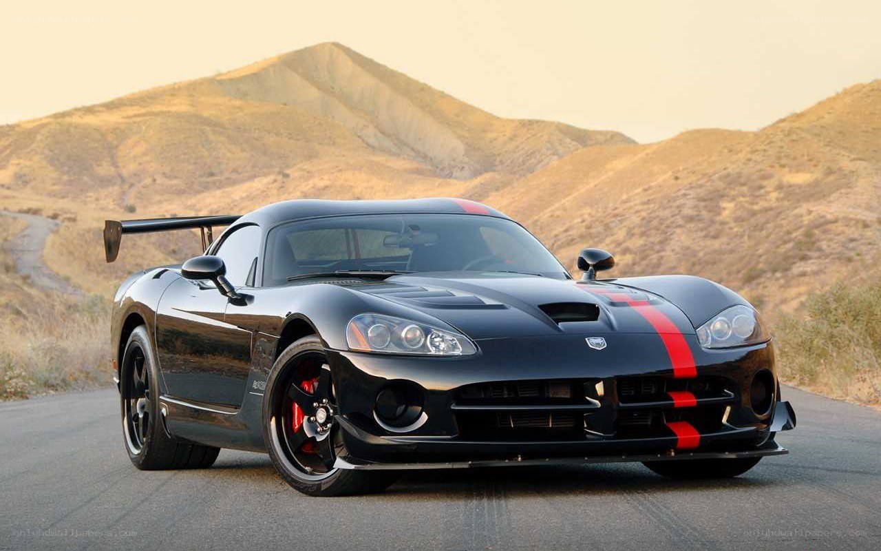 black dodge viper on mountain road