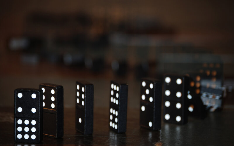 Black Dominoes in Line