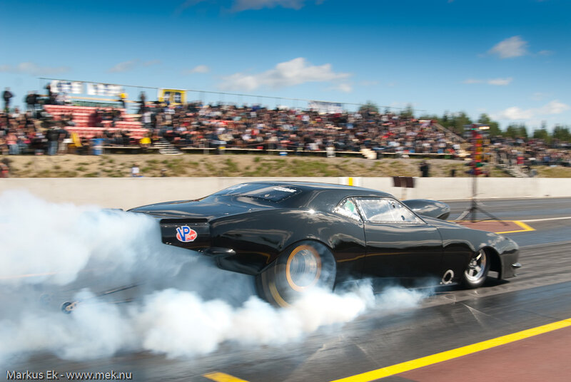 Black Drag Racing Car — Dynamic