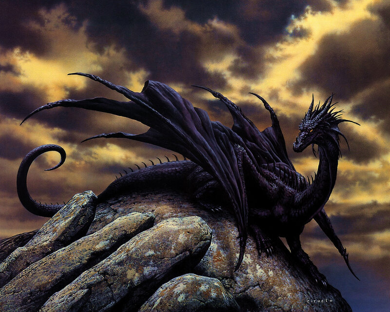 Black dragon on rocky peak