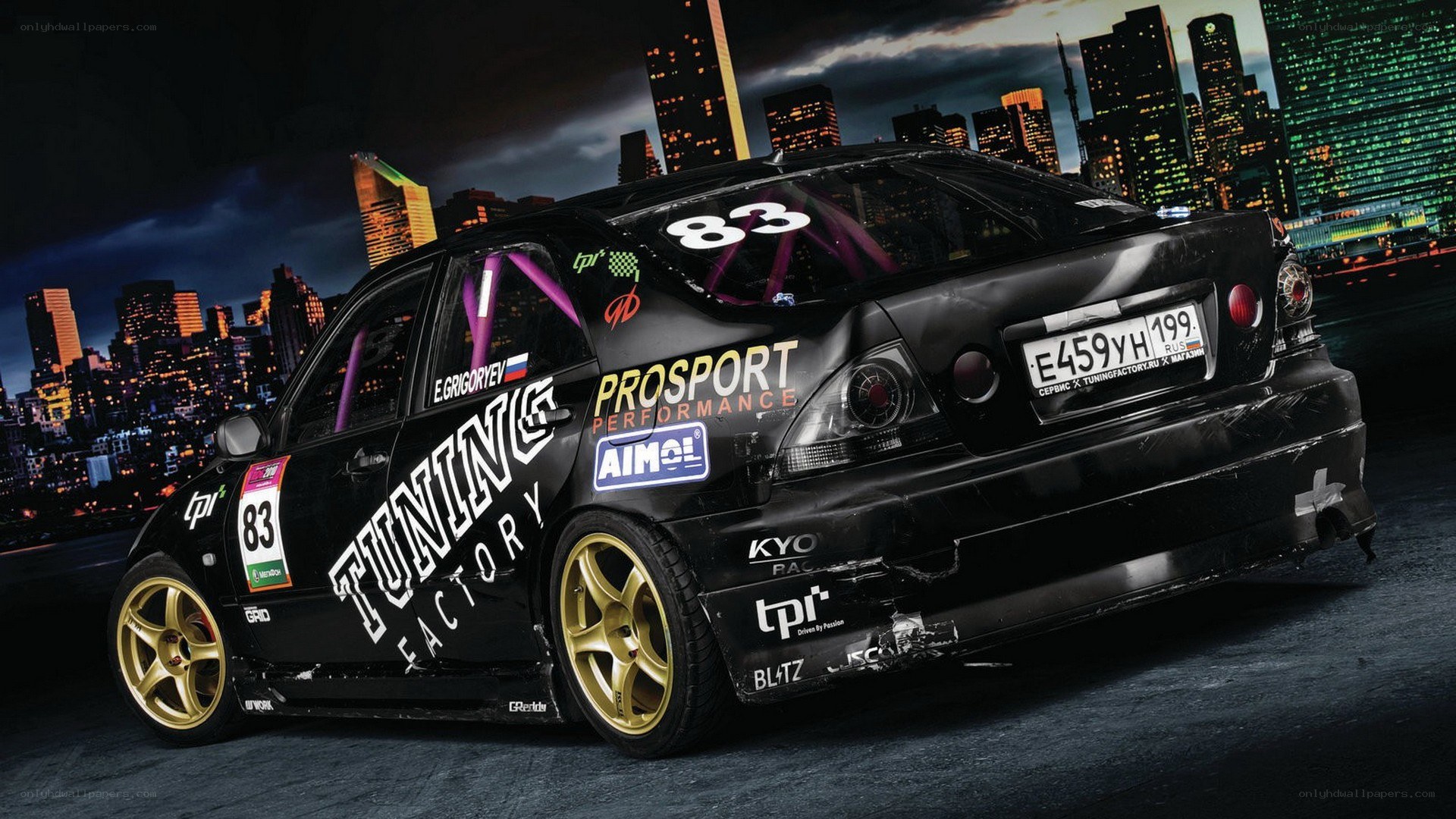 black drift car at night