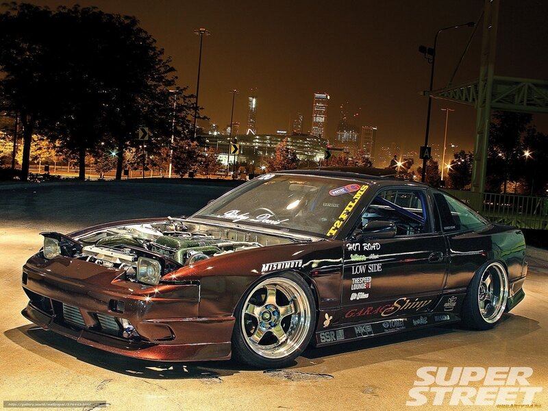 black drift car at night