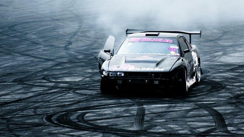 Black Drift Car — Dramatic, Photograph, Tire Marks