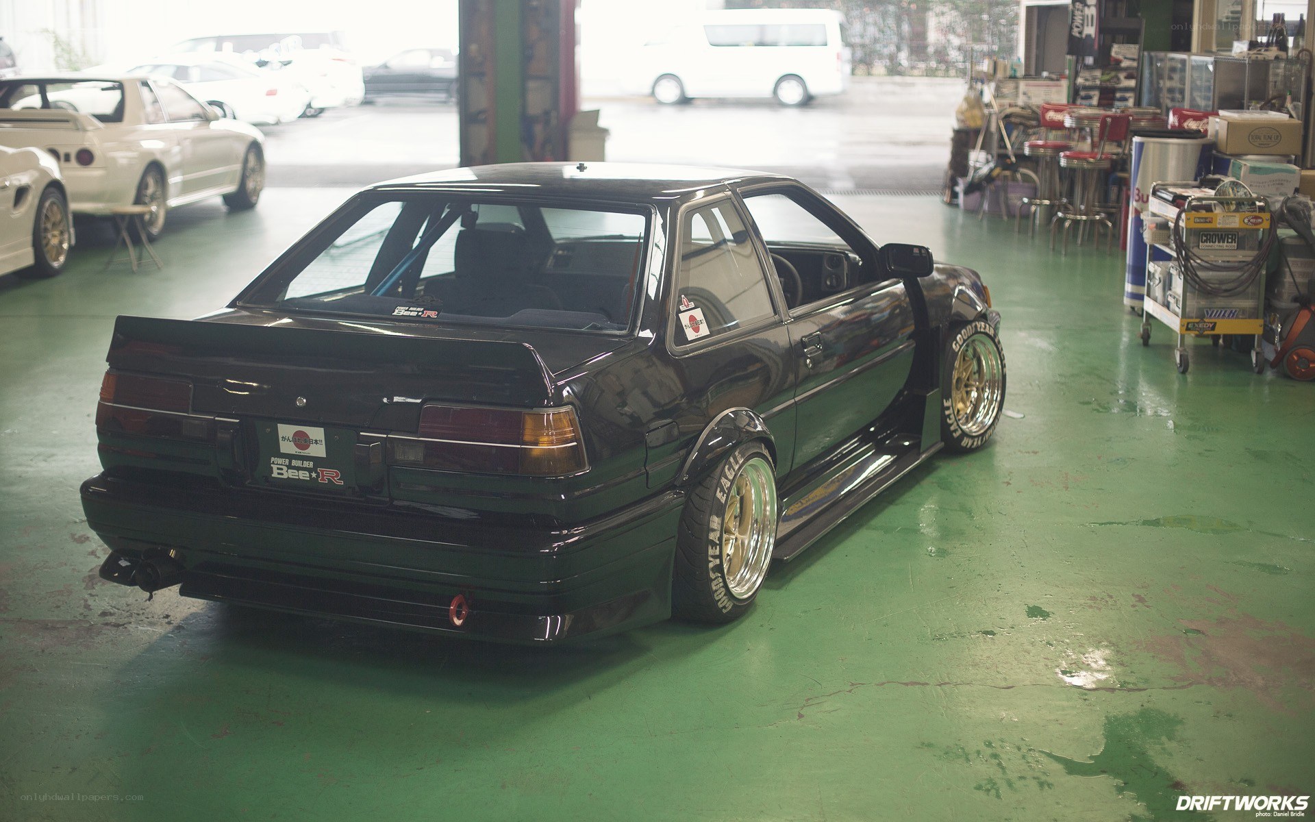 black drift car in garage