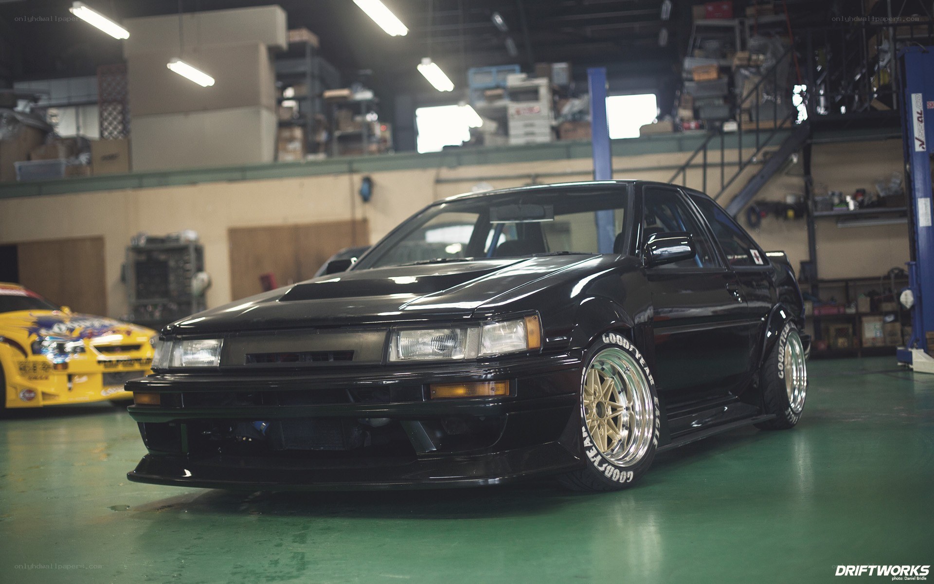 Black drift car in garage