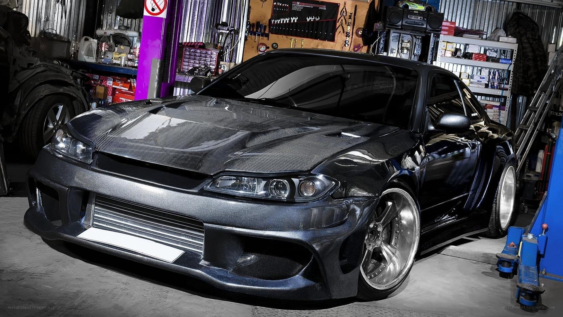 black drift car in garage