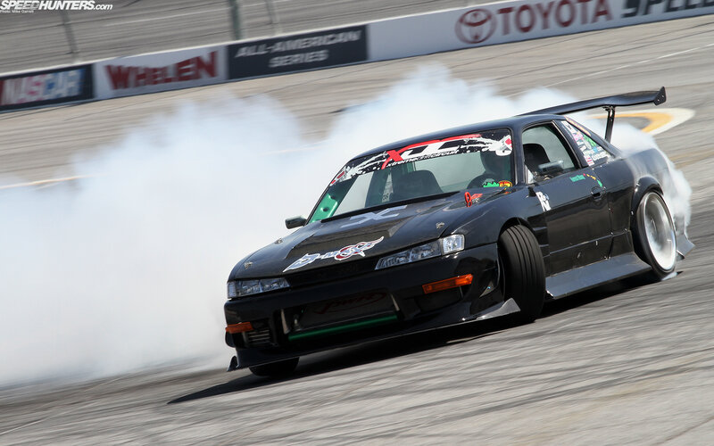 Black drift car on track