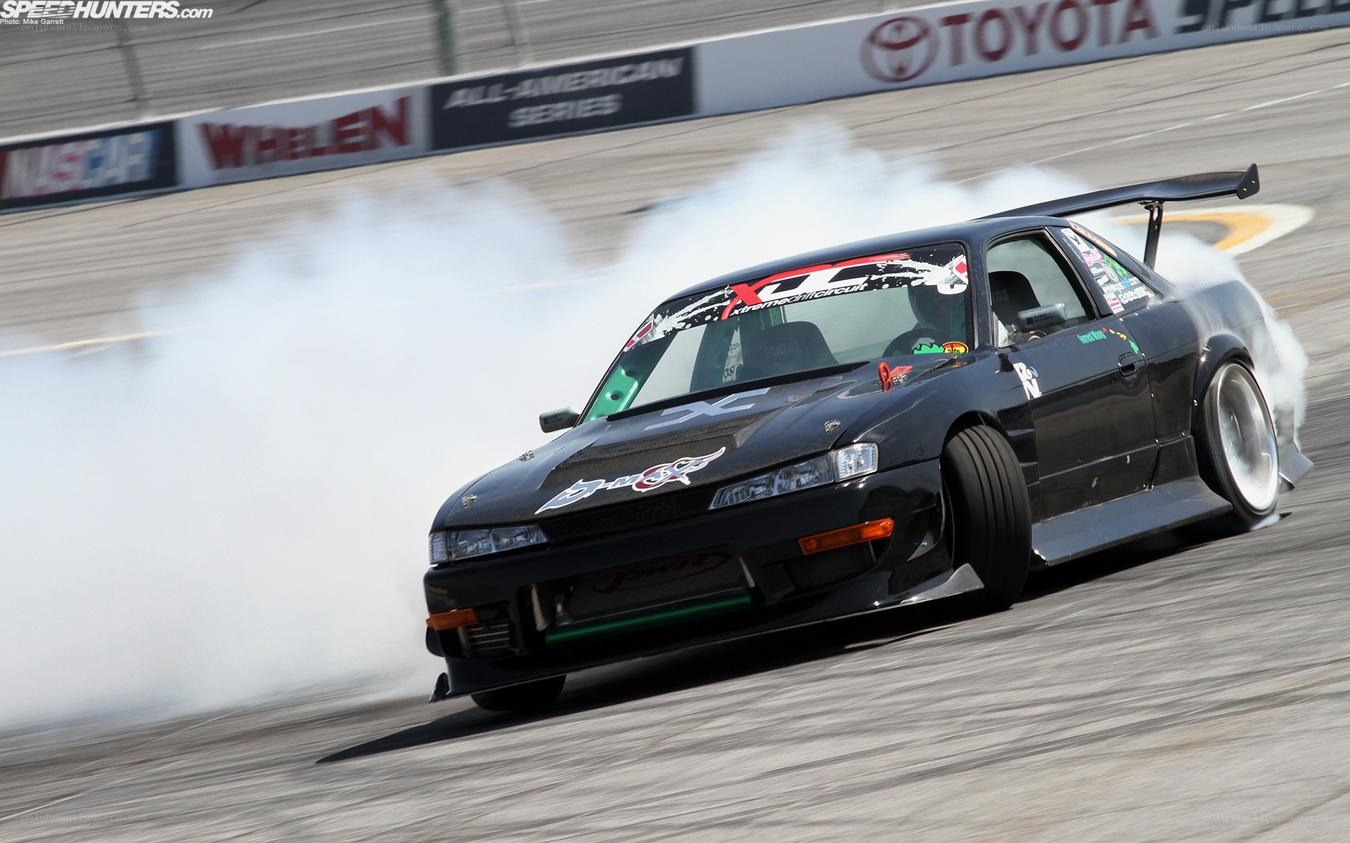 Black drift car on track