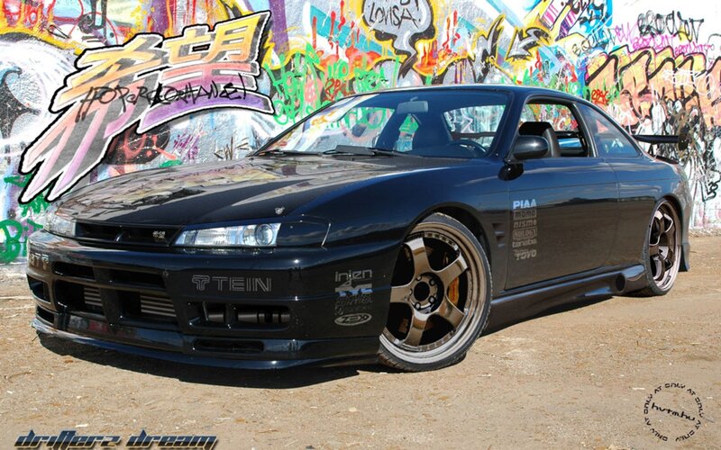 black drift car with graffiti