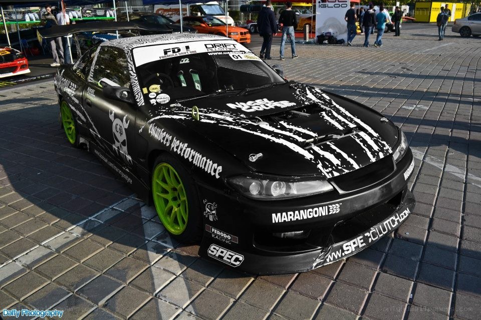 Black drift car with green wheels