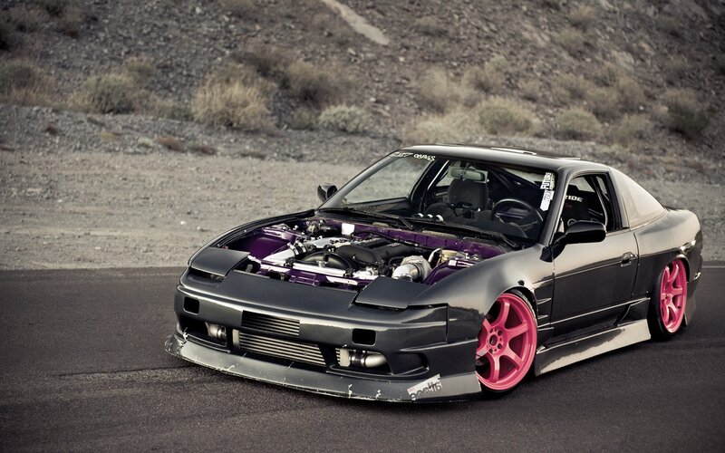 black drift car with pink wheels