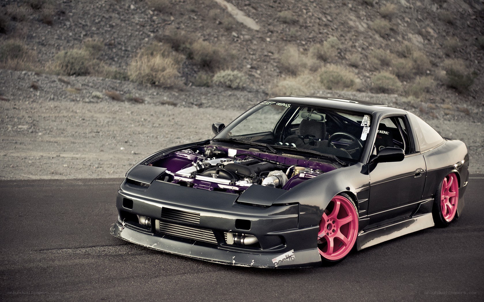 black drift car with pink wheels