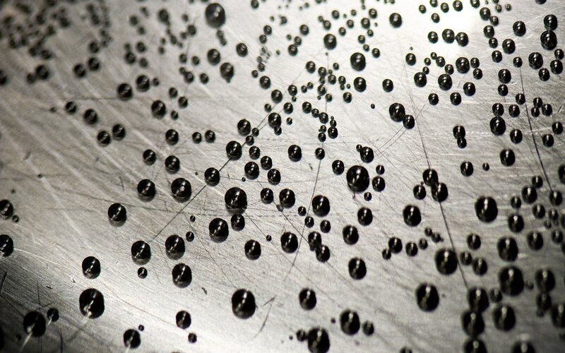 Black Droplets on Metal — Neutral