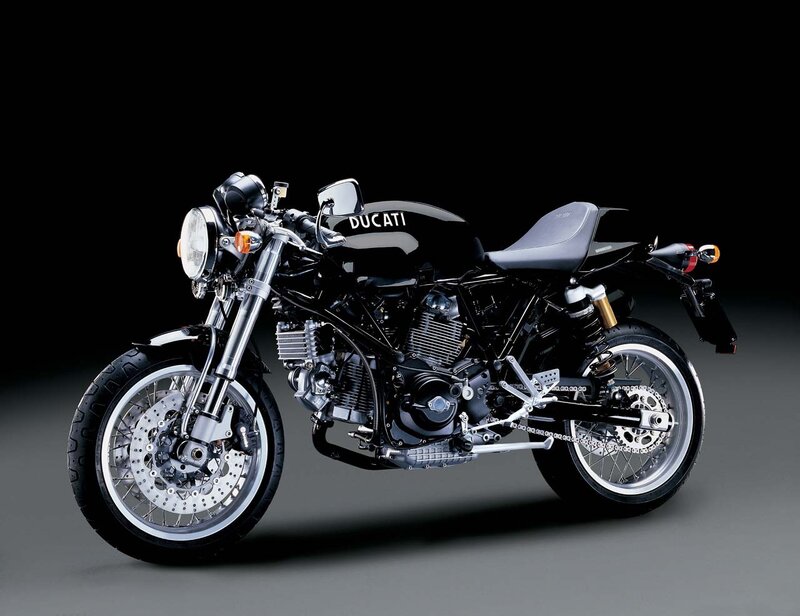 Black Ducati Motorcycle — Dramatic, Photograph, Headlight, Seat, Exhaust
