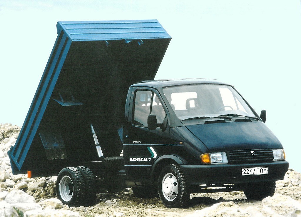 Black dump truck with raised bed