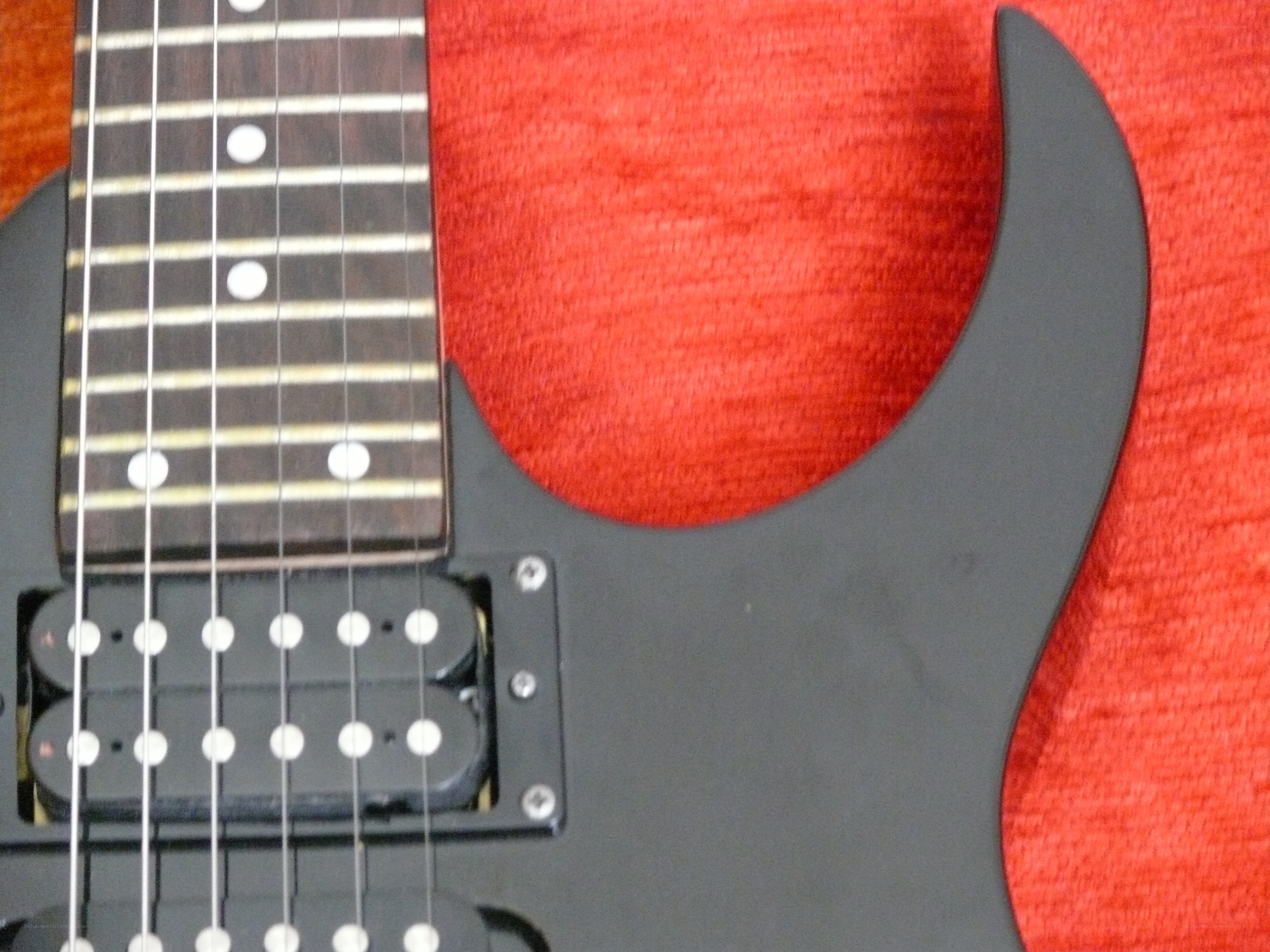 black electric guitar body