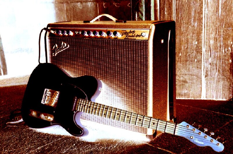 Black Electric Guitar — Brown