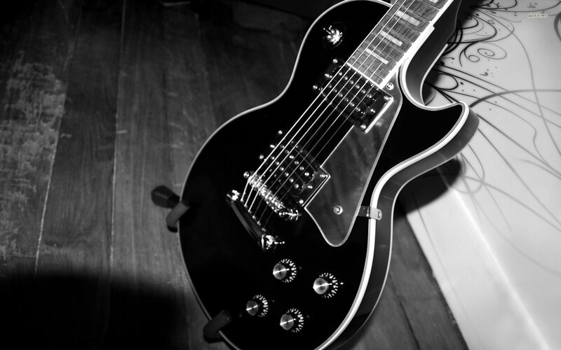 Black Electric Guitar — Dramatic, Photograph, Wood Floor