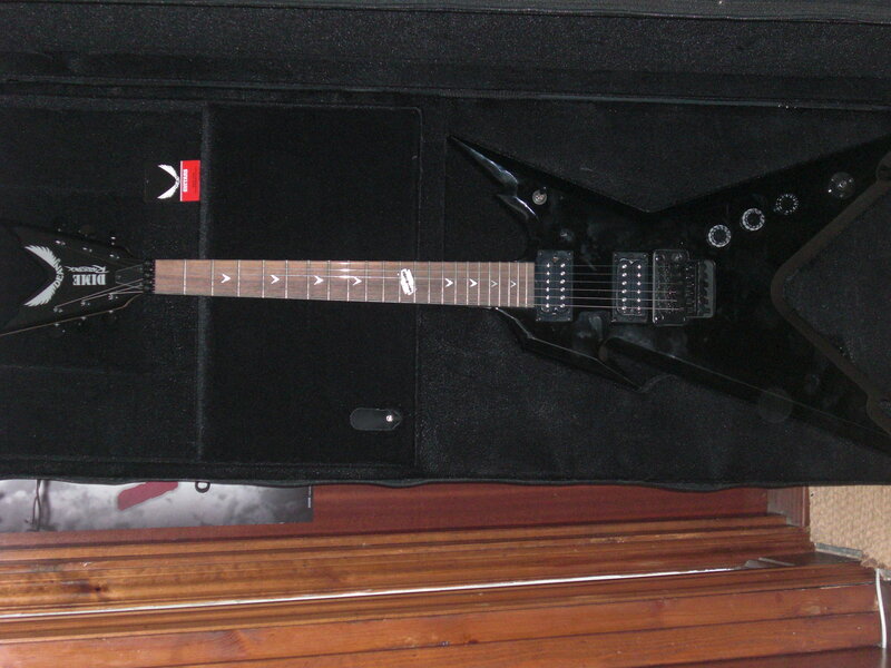 black electric guitar in case