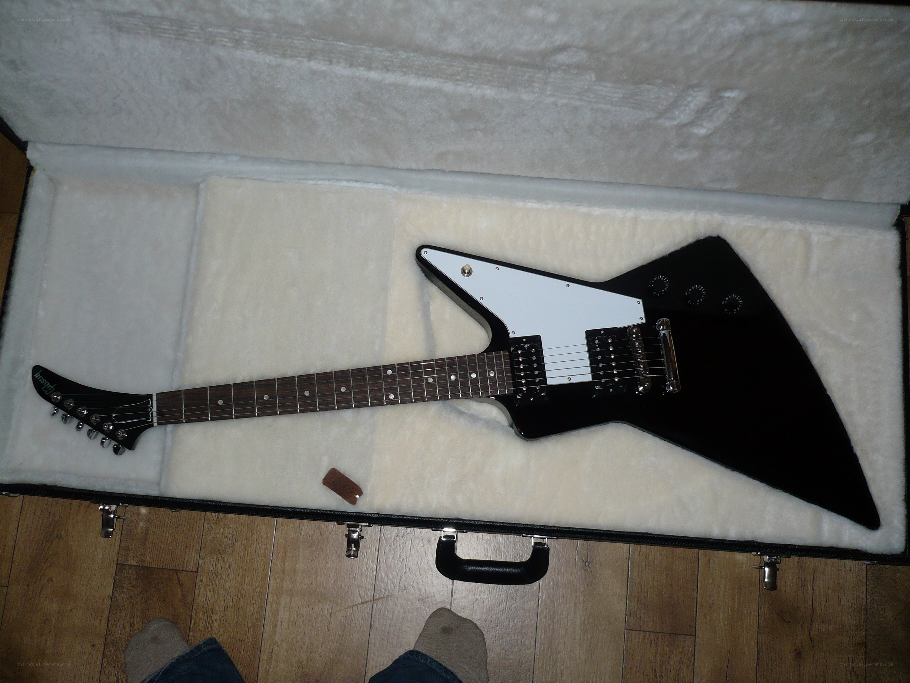 black electric guitar in case