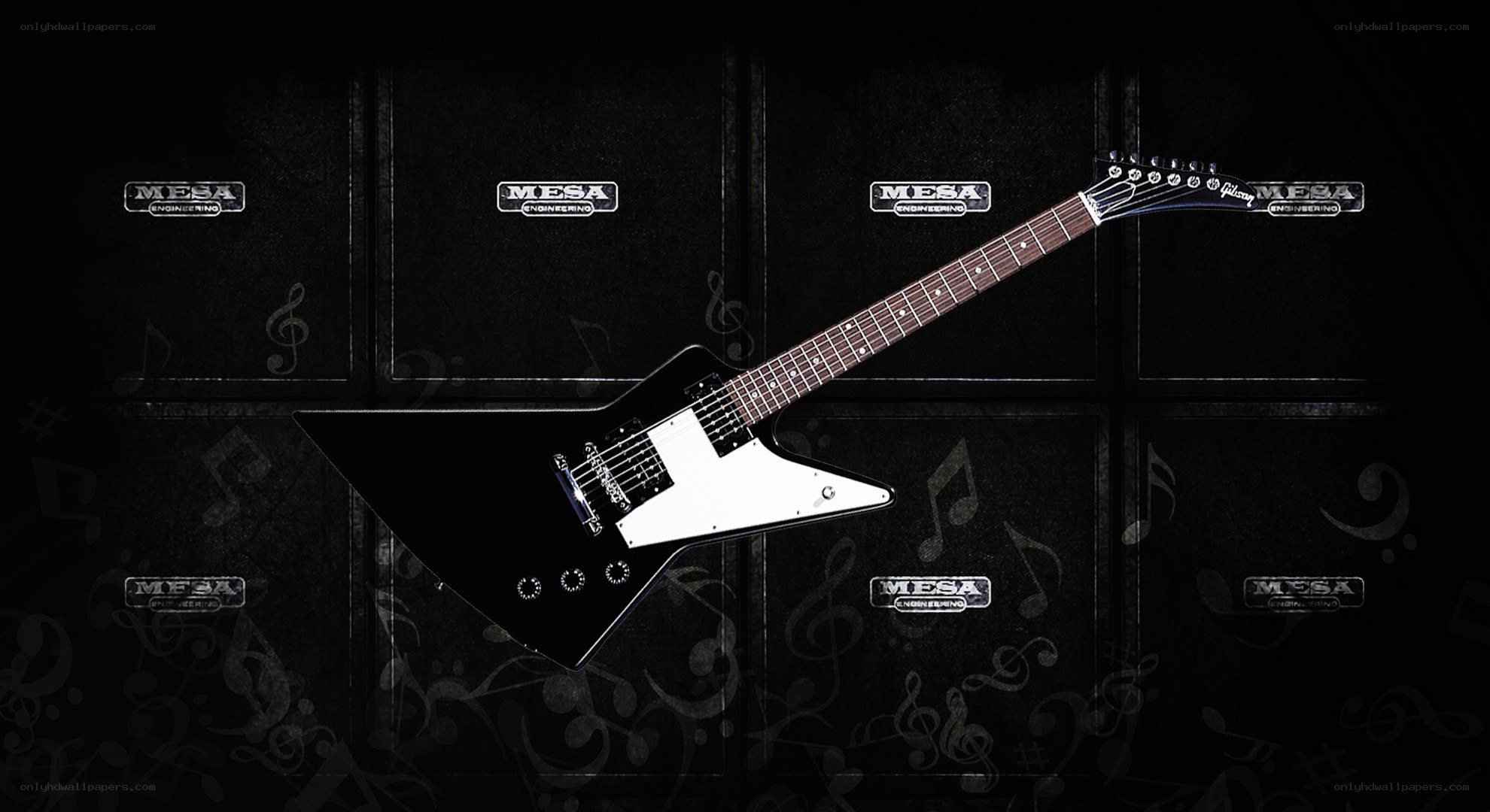 black electric guitar on amplifier