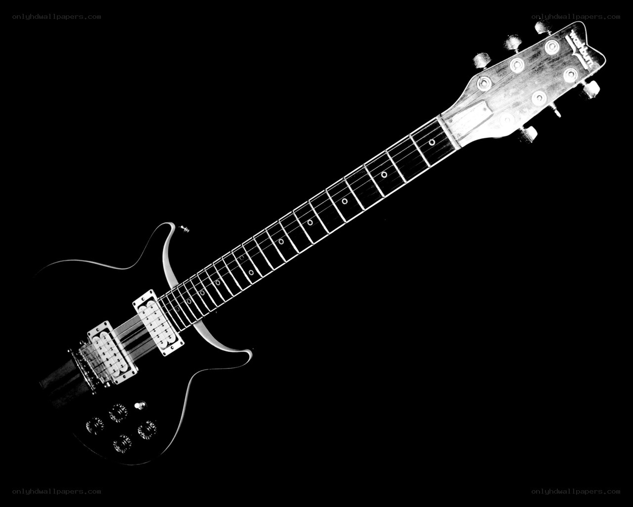 black electric guitar on black background