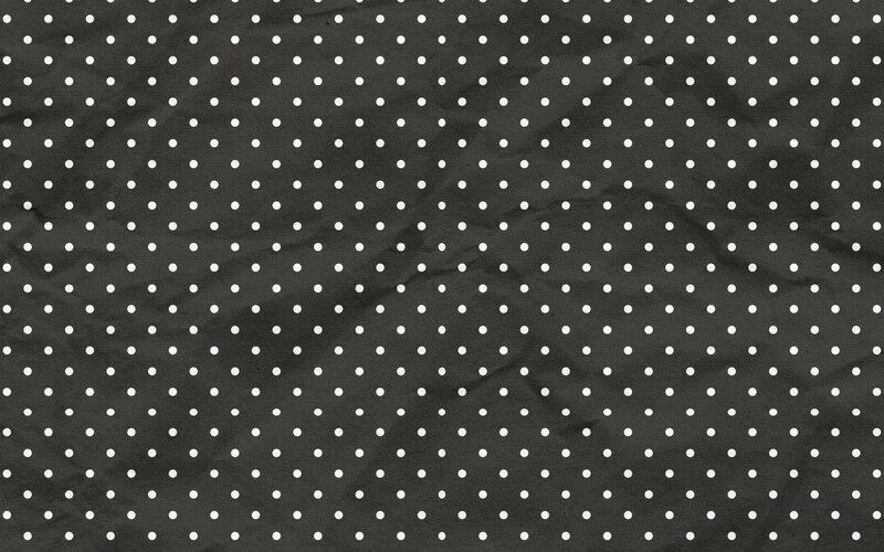black fabric with white polka dots