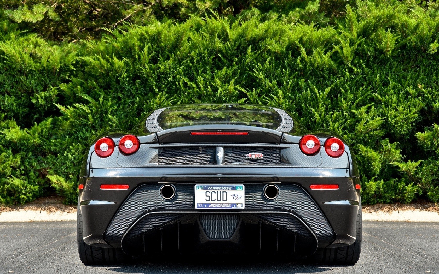 black ferrari 430 rear view