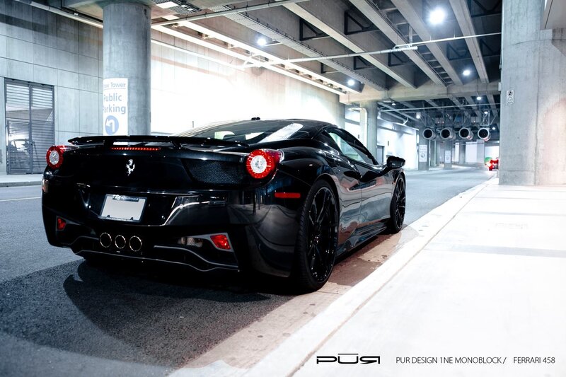 Black Ferrari 458 in parking garage