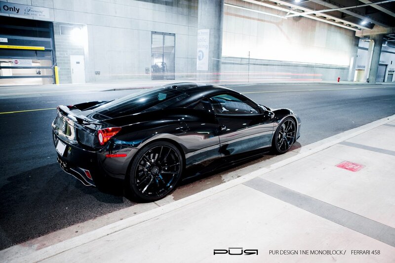Black Ferrari 458 in parking garage