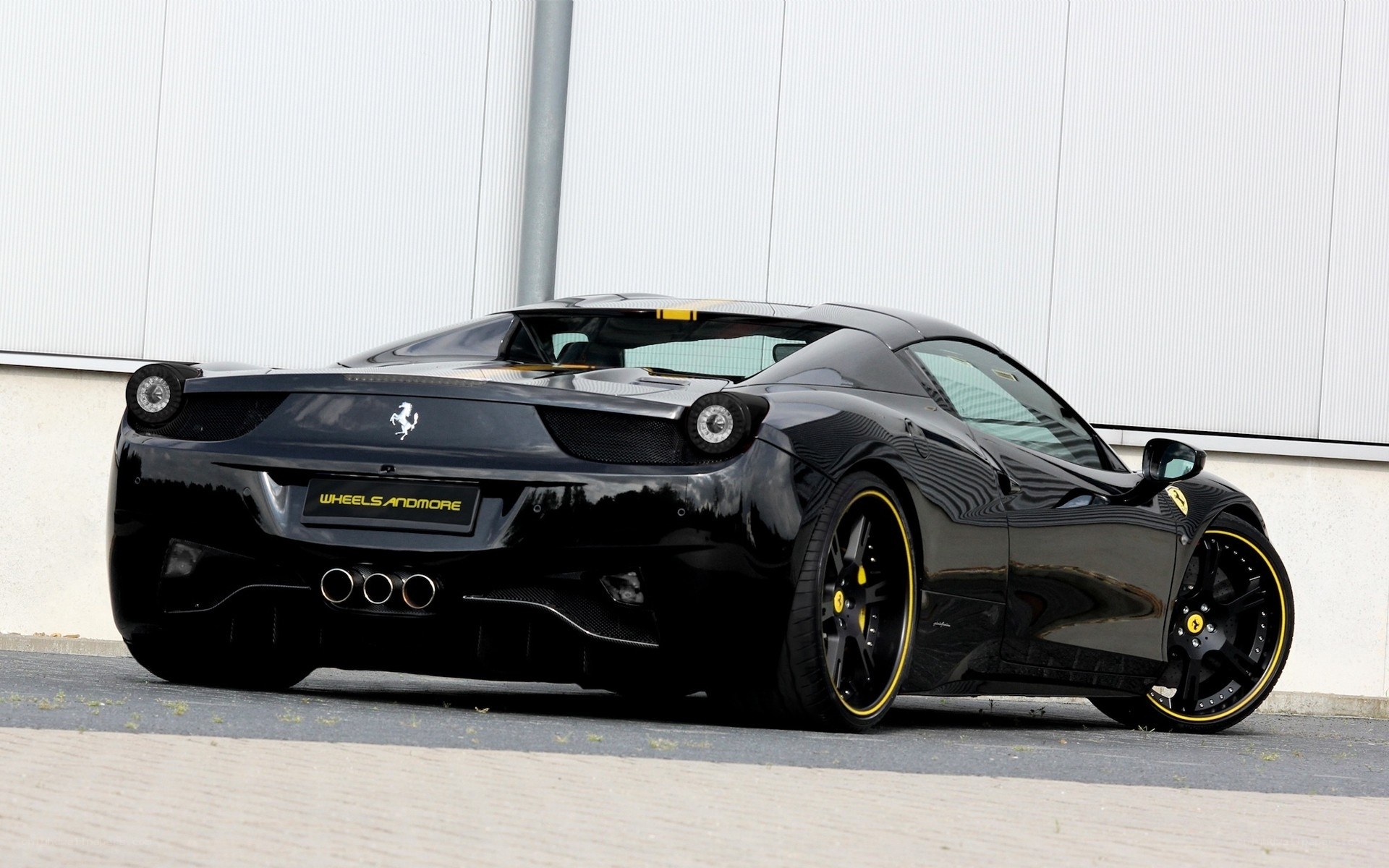 Black Ferrari 458 with custom wheels