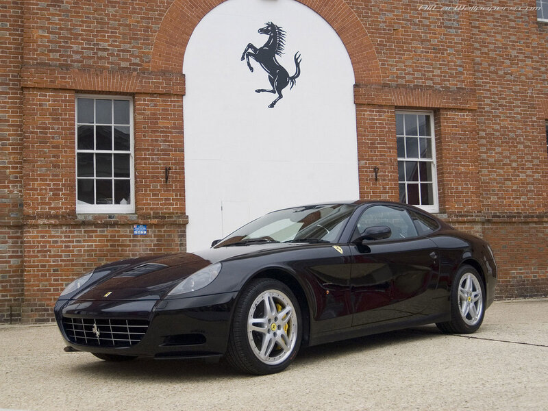 Black Ferrari 575M parked outside