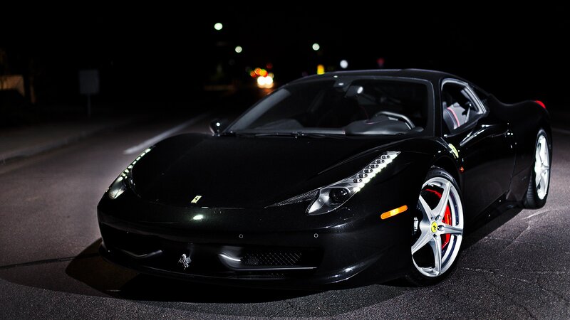black ferrari at night